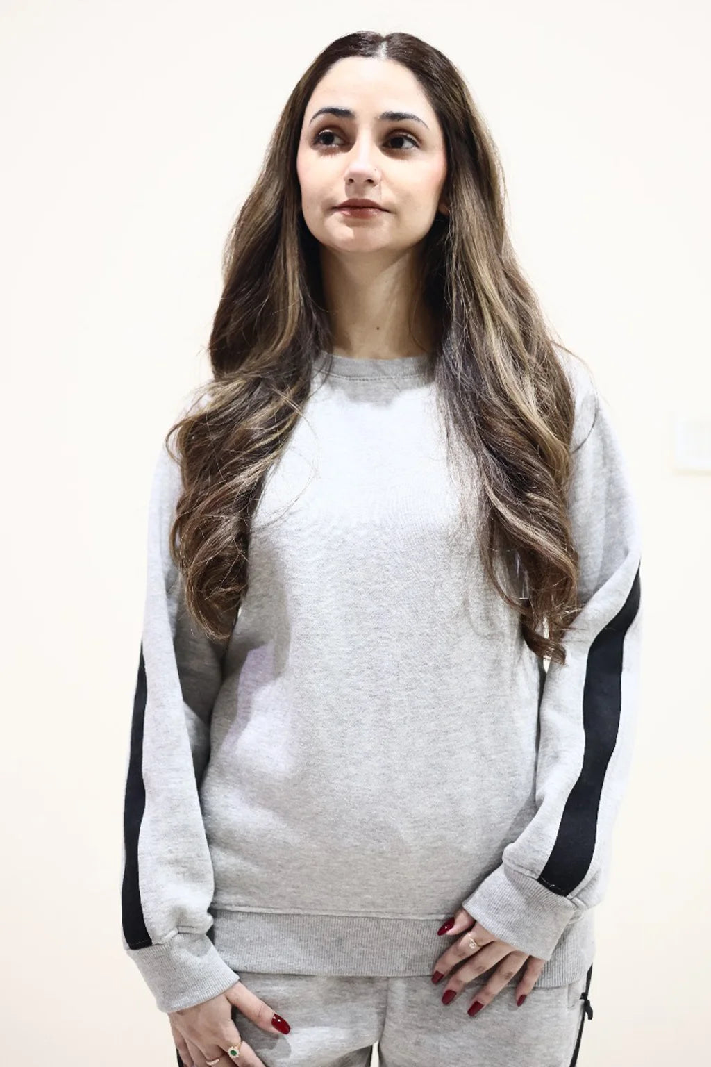 Model wearing Grey Tracksuit with Black Border stripes on arms Fleece winter suit