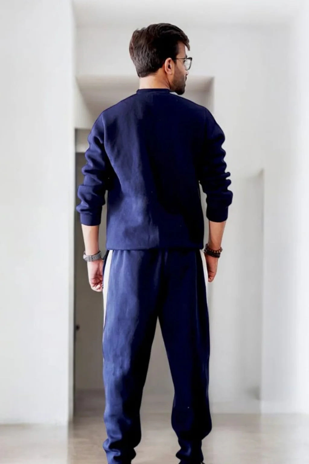 Nxtwears unisex navy blue sweatsuit with white stripe borders for men and women back view of co-ord set