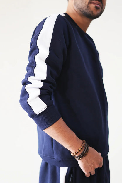 Close-up of white stripe border detailing on Nxtwears navy blue unisex winter sweatsuit for men and women