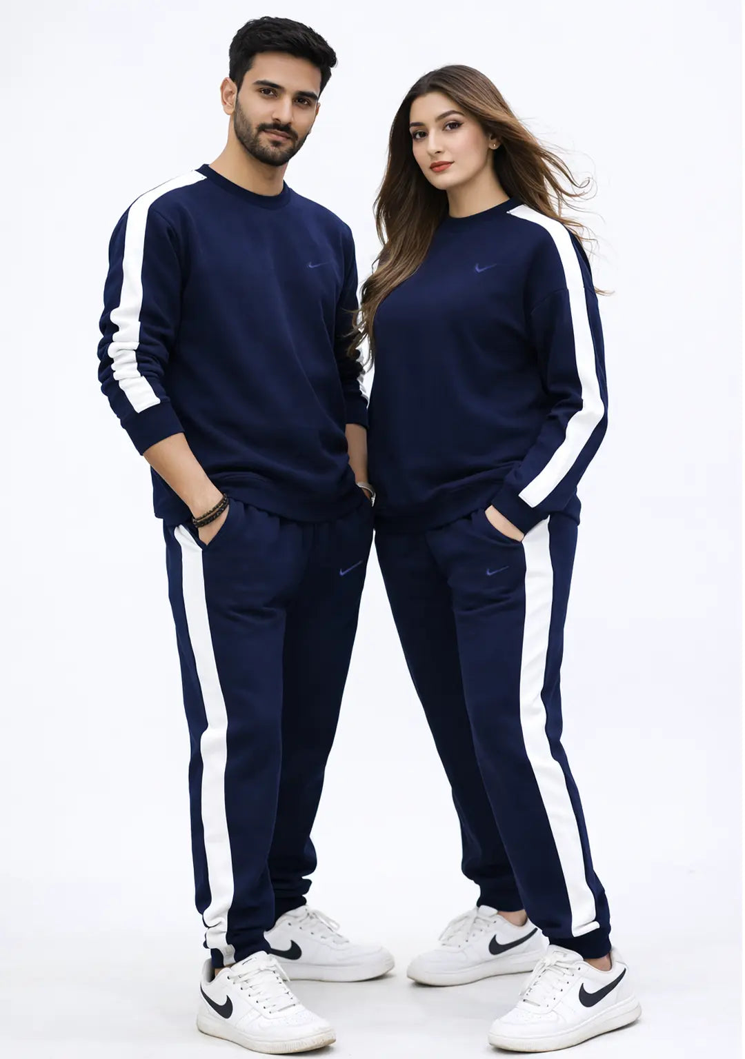 Girl & Boy wearing Unisex Blue Tracksuit in Fleece with White Stripes on Arm