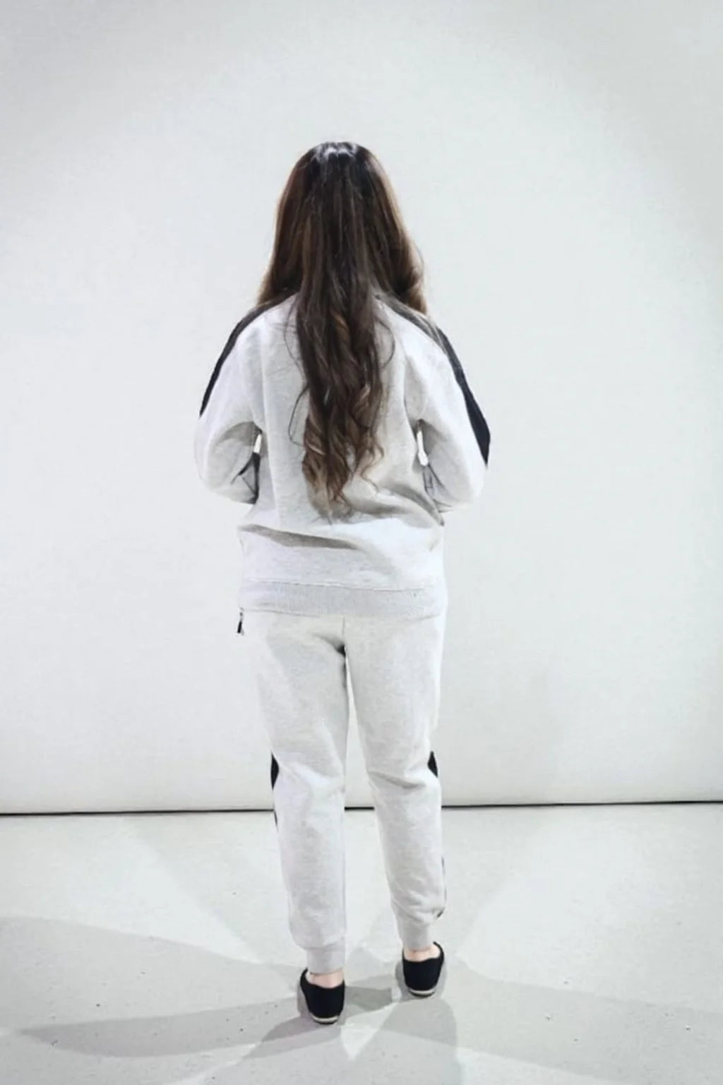 Nxtwears unisex grey sweatsuit with black stripe borders, back view of co-ord set