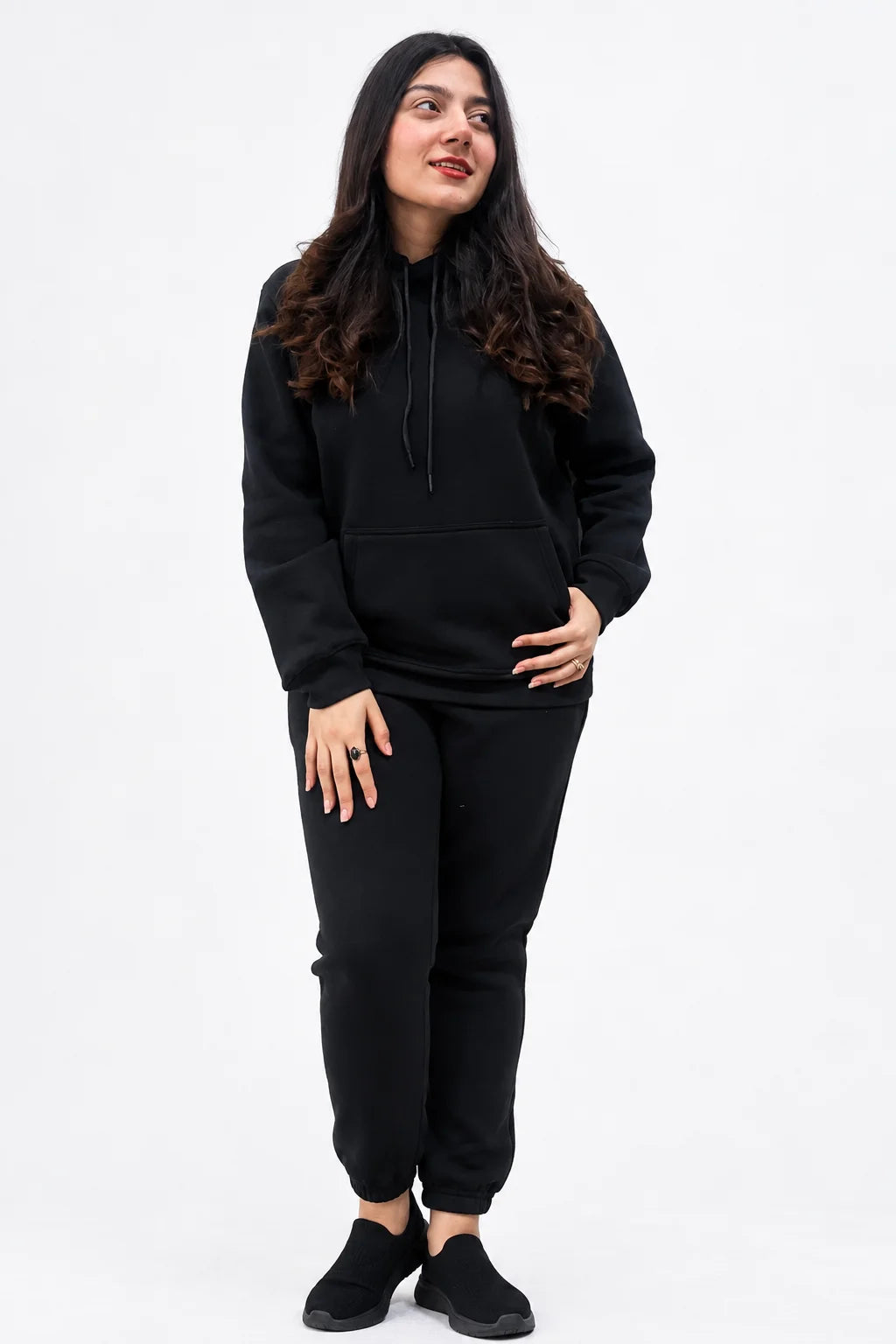 Women wearing Black Hoodie with a matching jogger pants