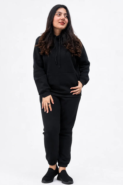 Women wearing Black Hoodie with a matching jogger pants