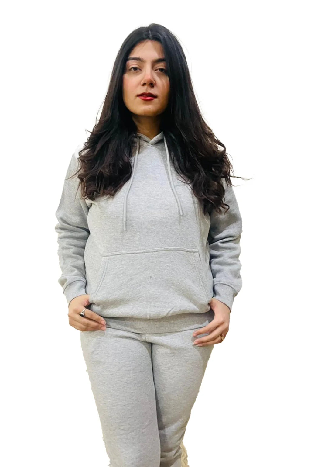 Front view of a person wearing heather grey Pulover Hoodie & jogger pants with ribbed cuffs and black slip-on sneakers.