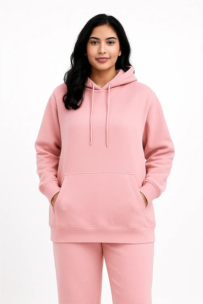 Front view of Women Wearing Hoodie and Jogger Pants with a plain background