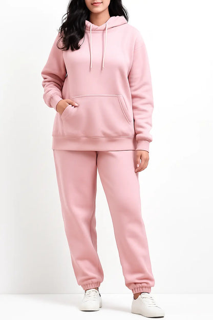 Front view of Women Wearing Hoodie and Jogger Pants with a plain background