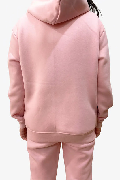 Back view of Women Wearing Hoodie and Jogger Pants in Fleece with a plain background