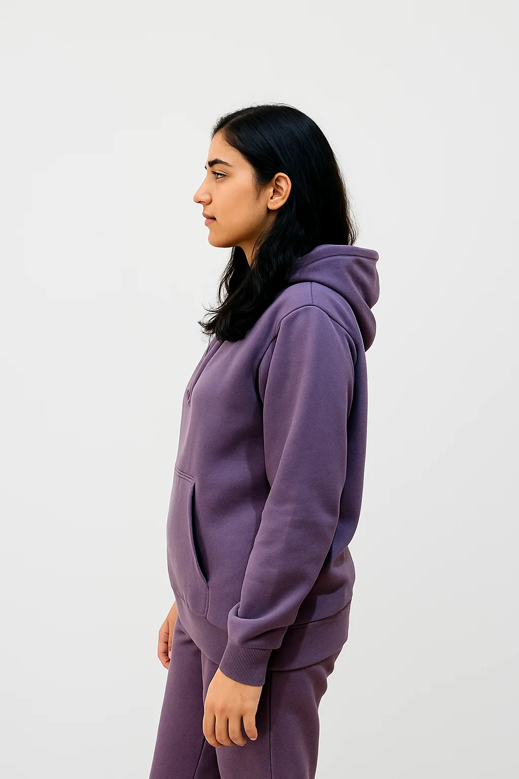 side view of Model wearing pullover Purple Hoodie & Joggerpants