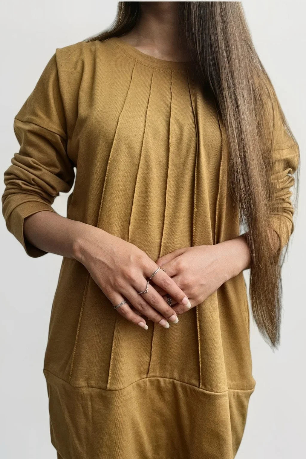 Detailed view of women’s mustard lounge set showing soft material and finish