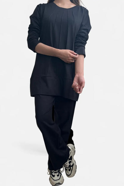 women is wearing black co-ordset in cotton posing for nxtwears