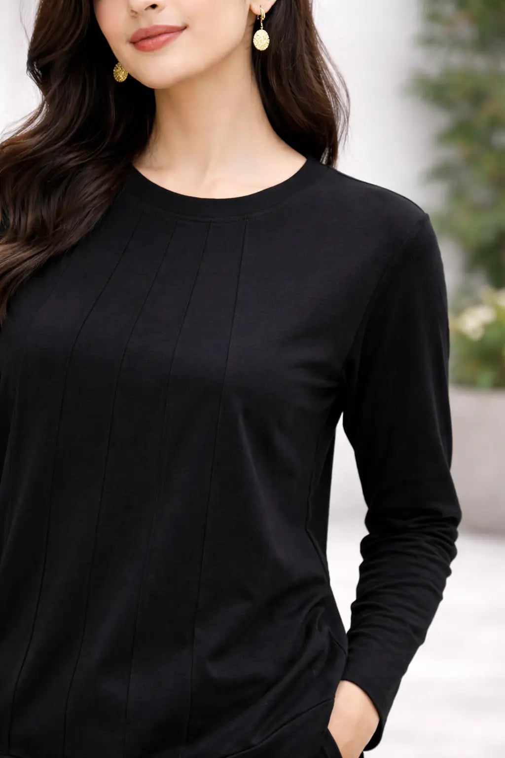 Women wearing black coordset close view
