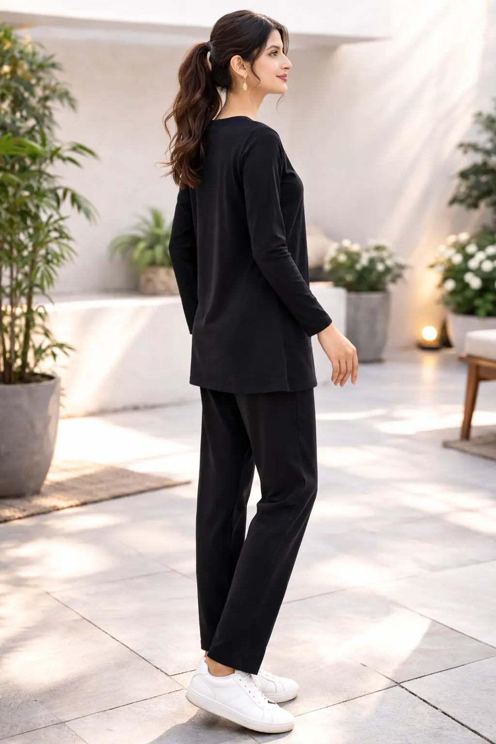 Women wearing black coordset side view