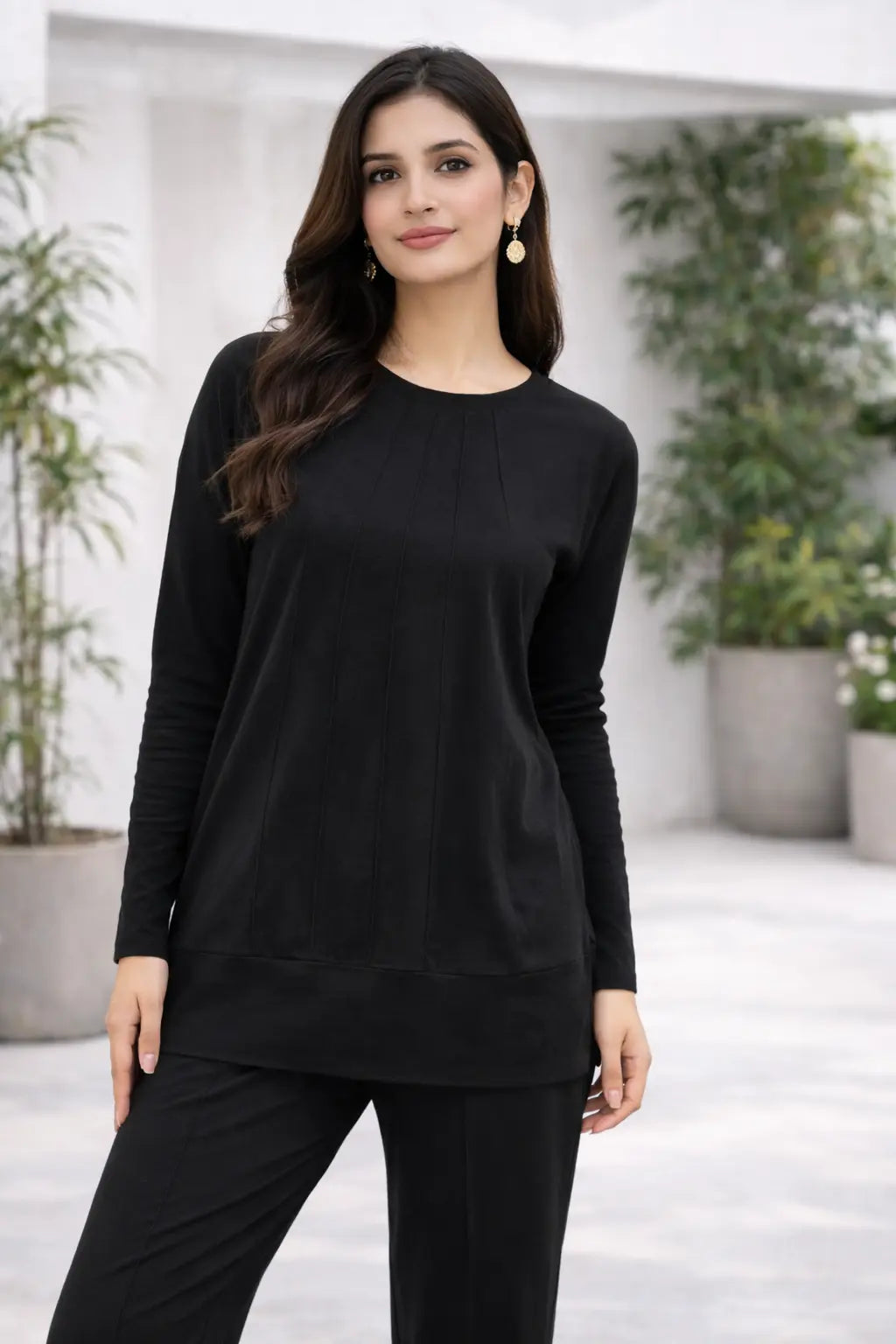 Women wearing black coordset front view