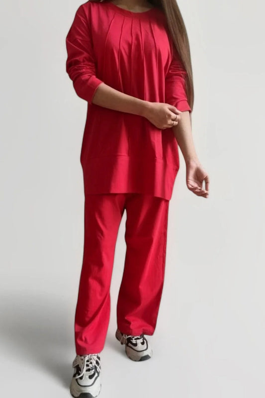 Women’s red co-ord set front view with relaxed fit top and wide-leg pants
