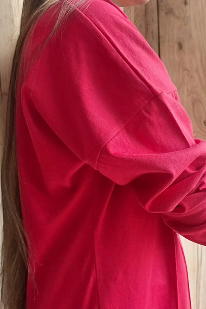 Side view of women’s red co-ord set with straight fit pants and tunic top