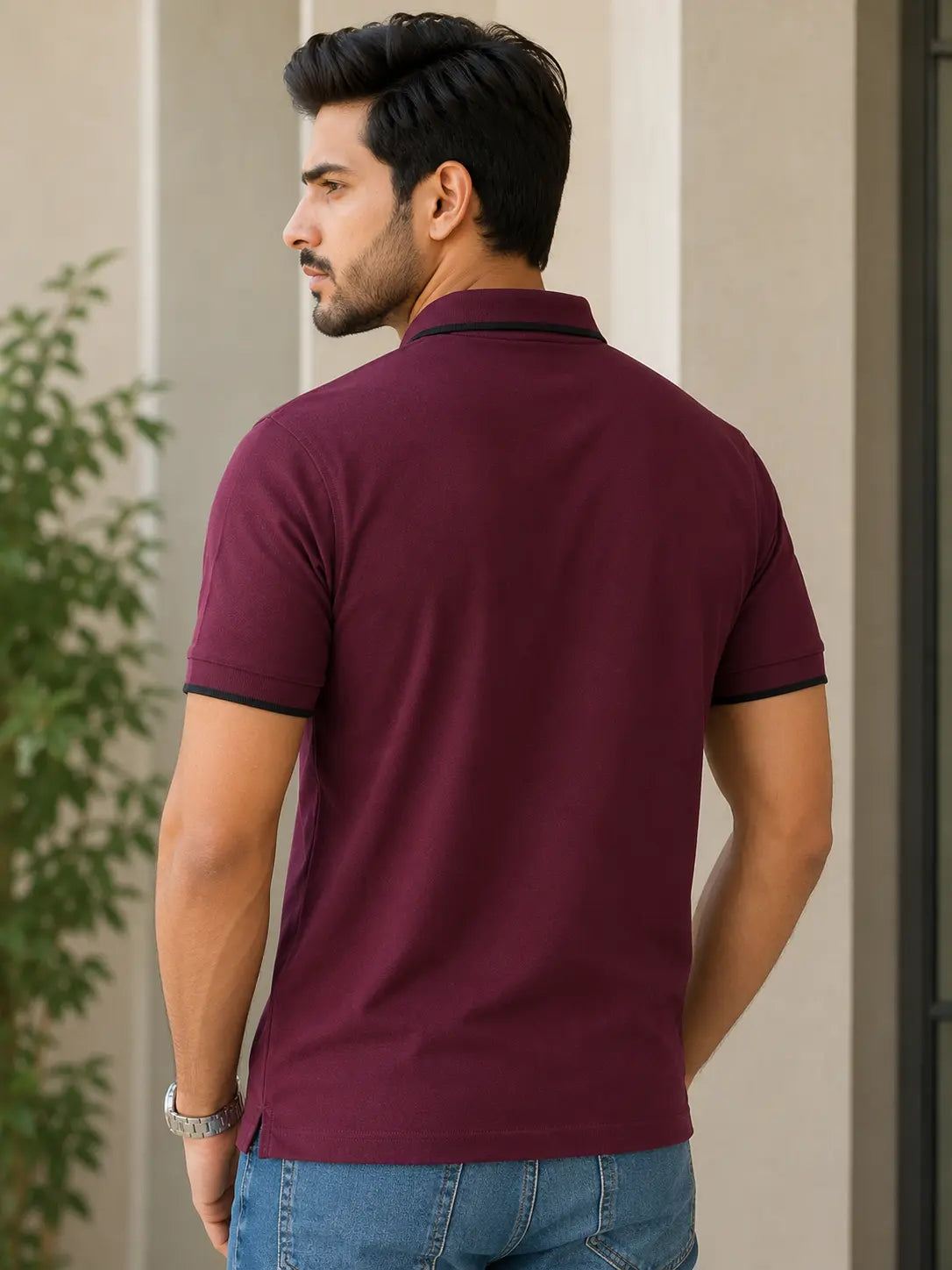 Men posing for nxtwears for back view of Men polo against a neutral background