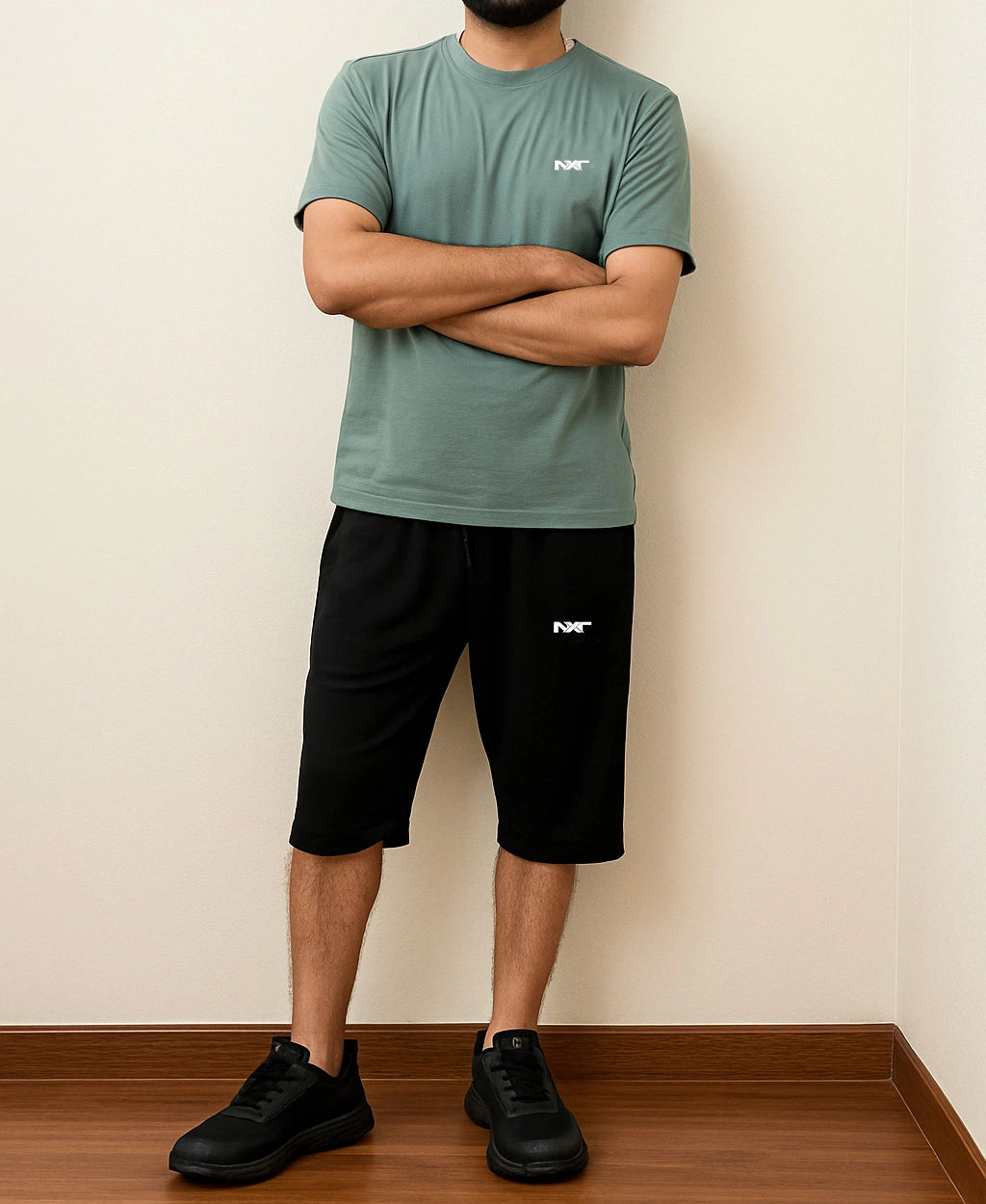 Men wearing Green Tee with Nxt logo and Shorts with Nxt logo front view