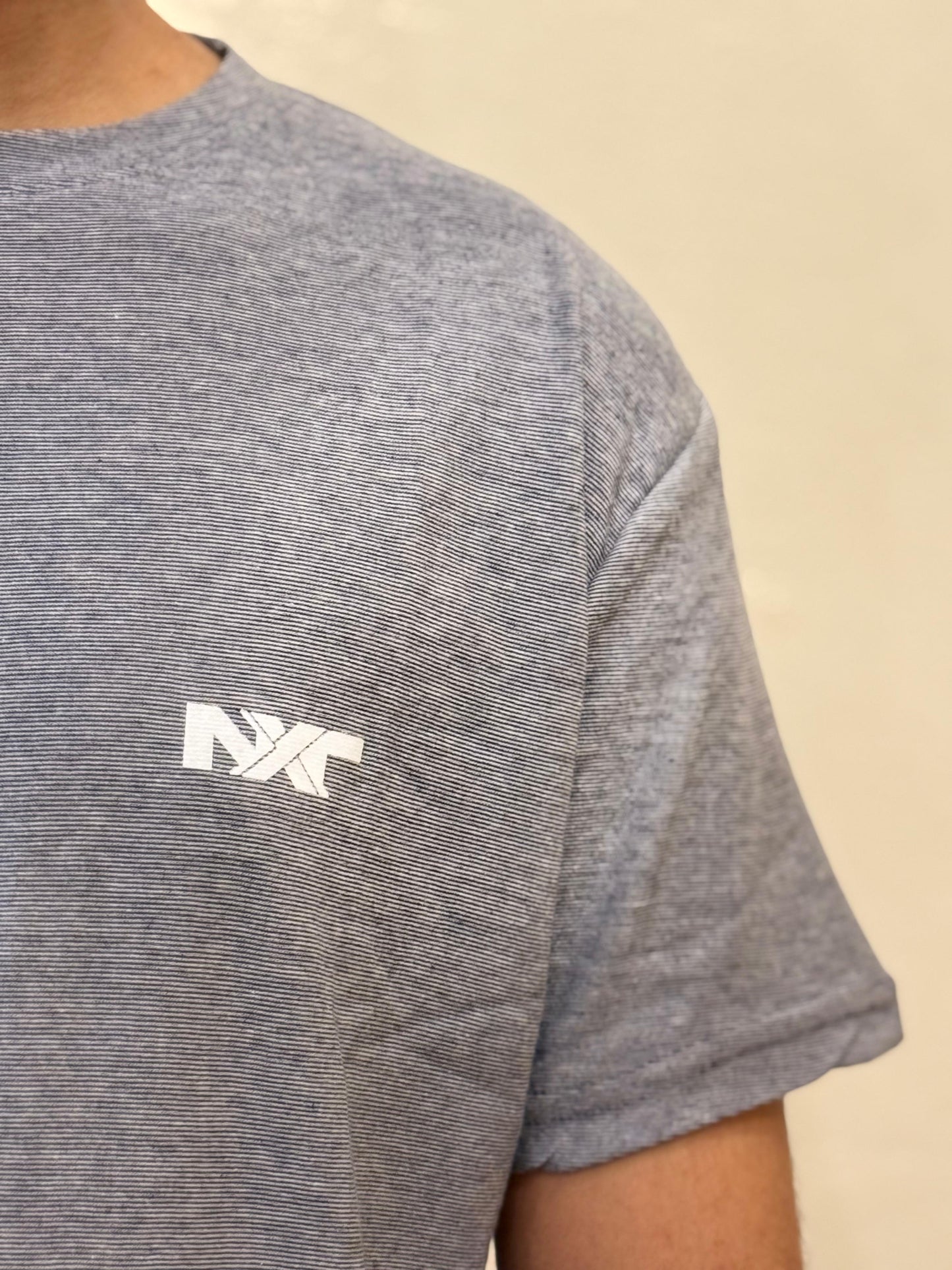 Close-up of Nxtwears men’s grey t-shirt fabric details