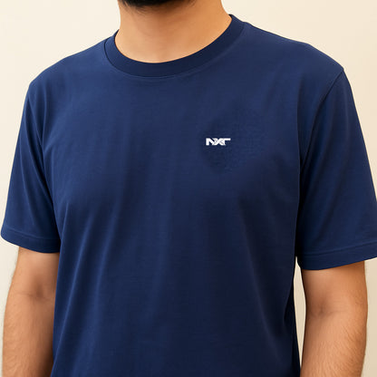 Close-up of Nxtwears navy cotton t-shirt with chest logo – premium men’s summer athleisure top