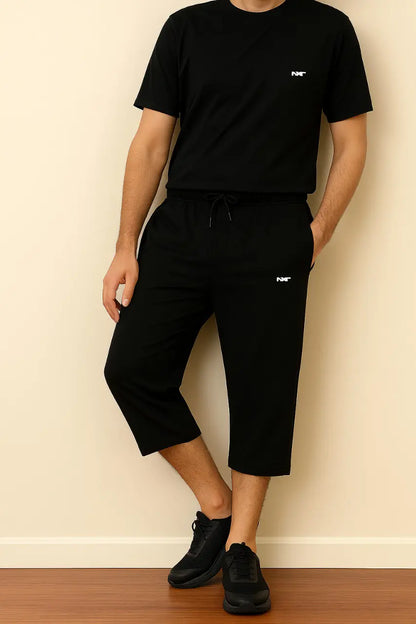 Model wearing Black Shorts & Shirt from NXT 3-Piece Set