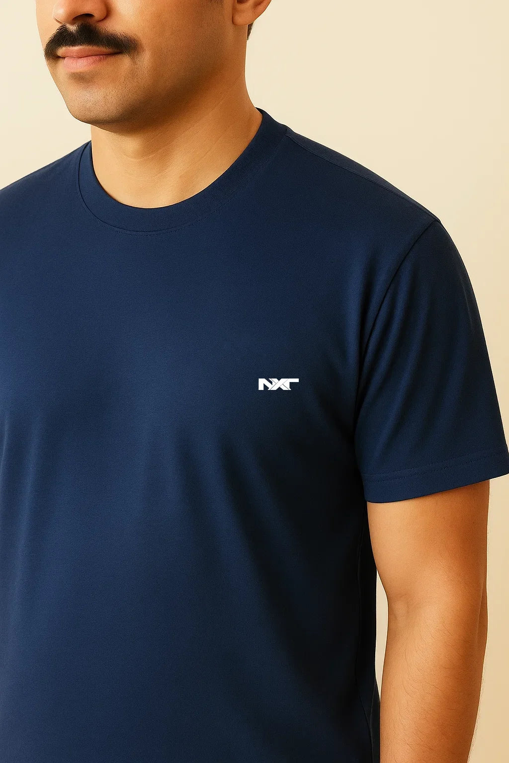 Close-up of Nxtwears logo on men’s navy cotton tracksuit top