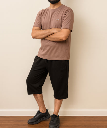 Side profile of men’s brown T-shirt and black shorts set – breathable cotton summer clothing by Nxtwears