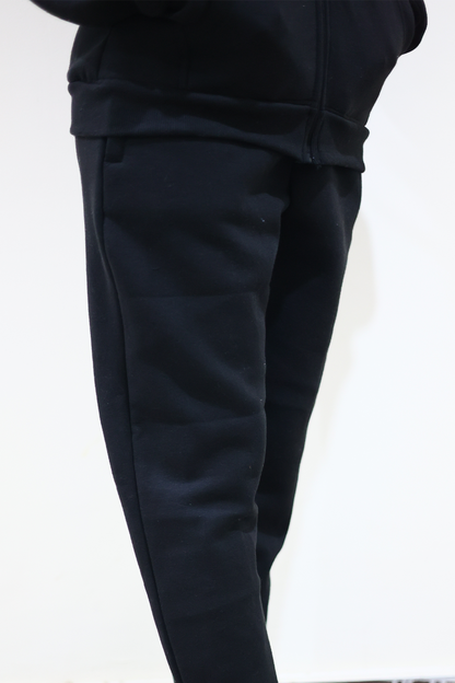 Close view of Nxtwears unisex Black zipper hoodie and pajama set wore by female model