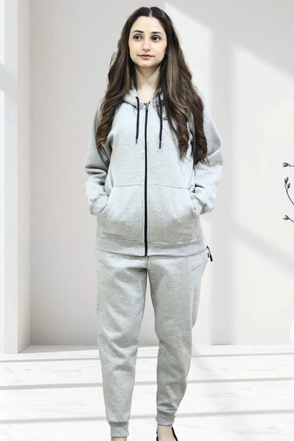 Female model wearing Grey zipper Hoodie Set Front view