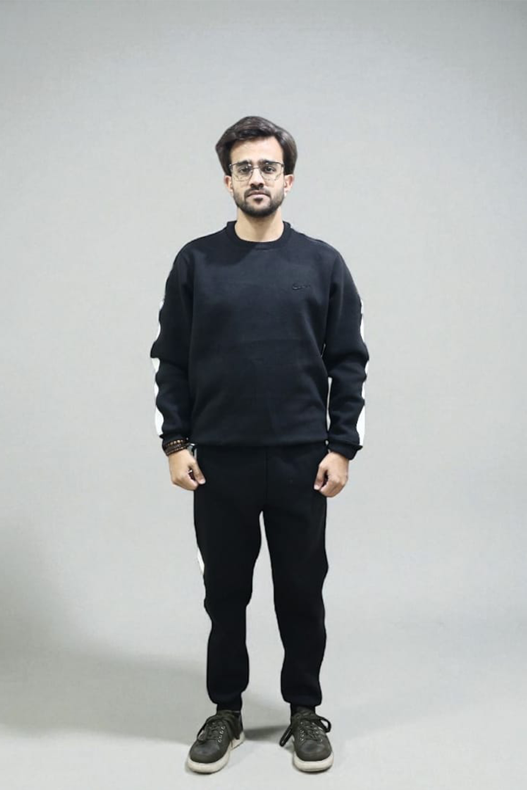 Nxtwears unisex black winter sweatsuit with white stripes  front view men