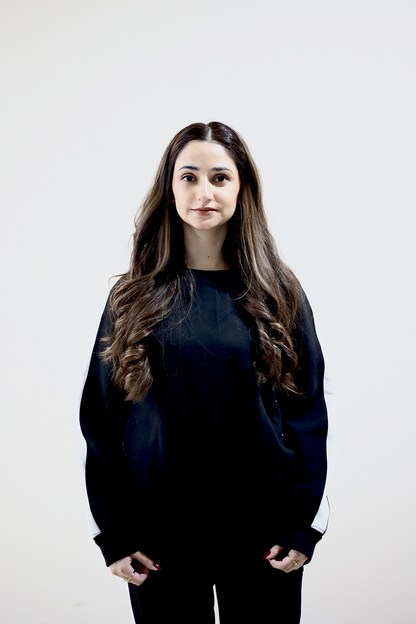 Front view of black winter sweat suit - co-ordset female pose