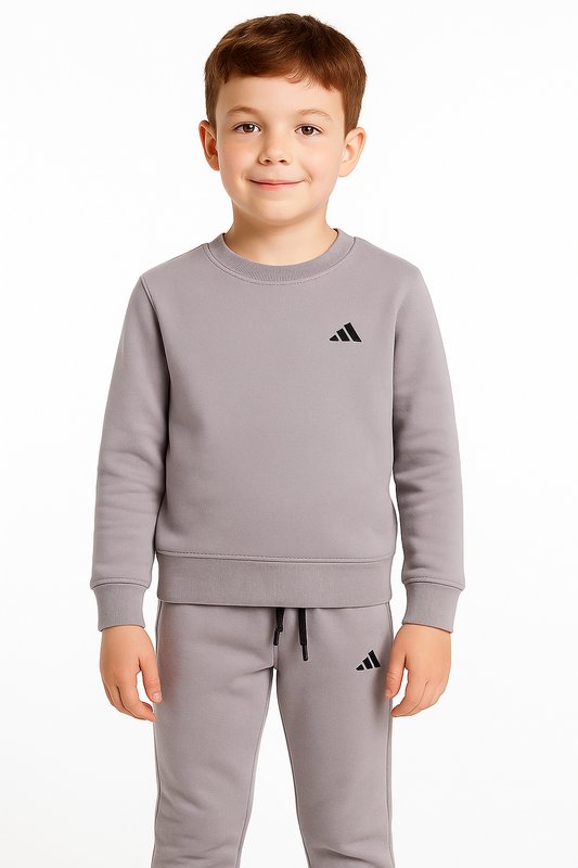 child wearing winter grey kids tracksuit set with sweatshirt and joggers with adidas logo